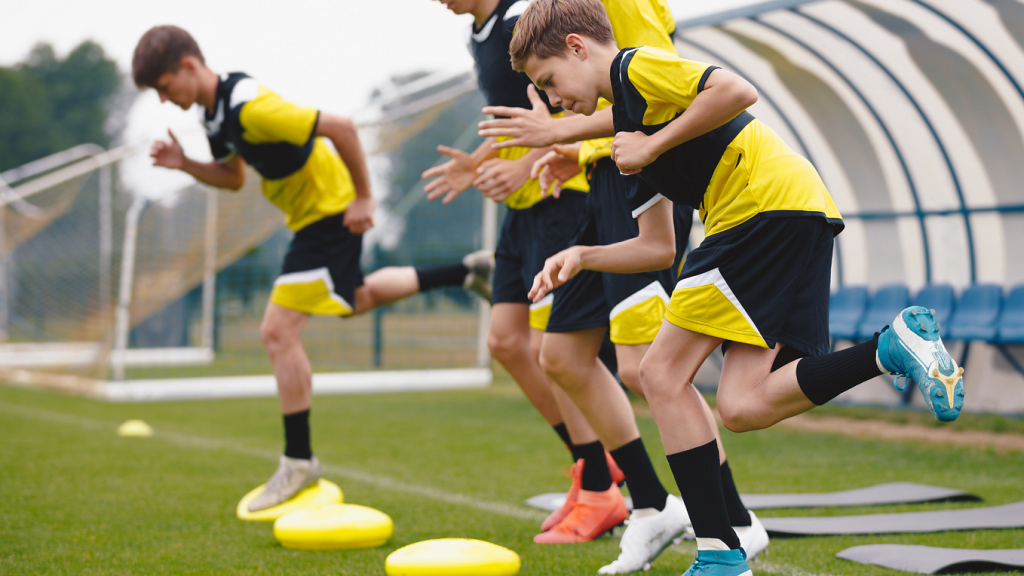 youth athletic training session with young athletes